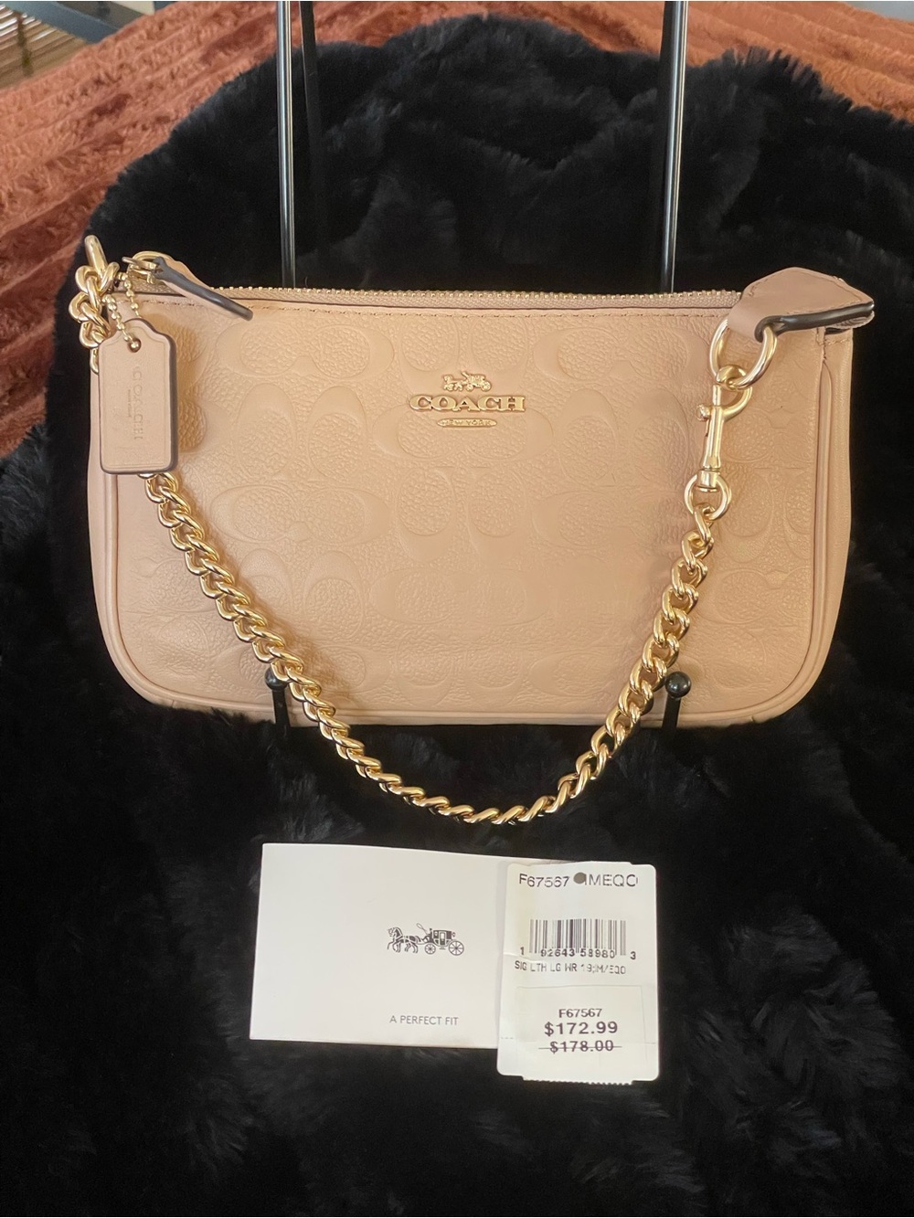 COACH Ivory Embossed Signature C Pebble Leather Large Wristlet F67567